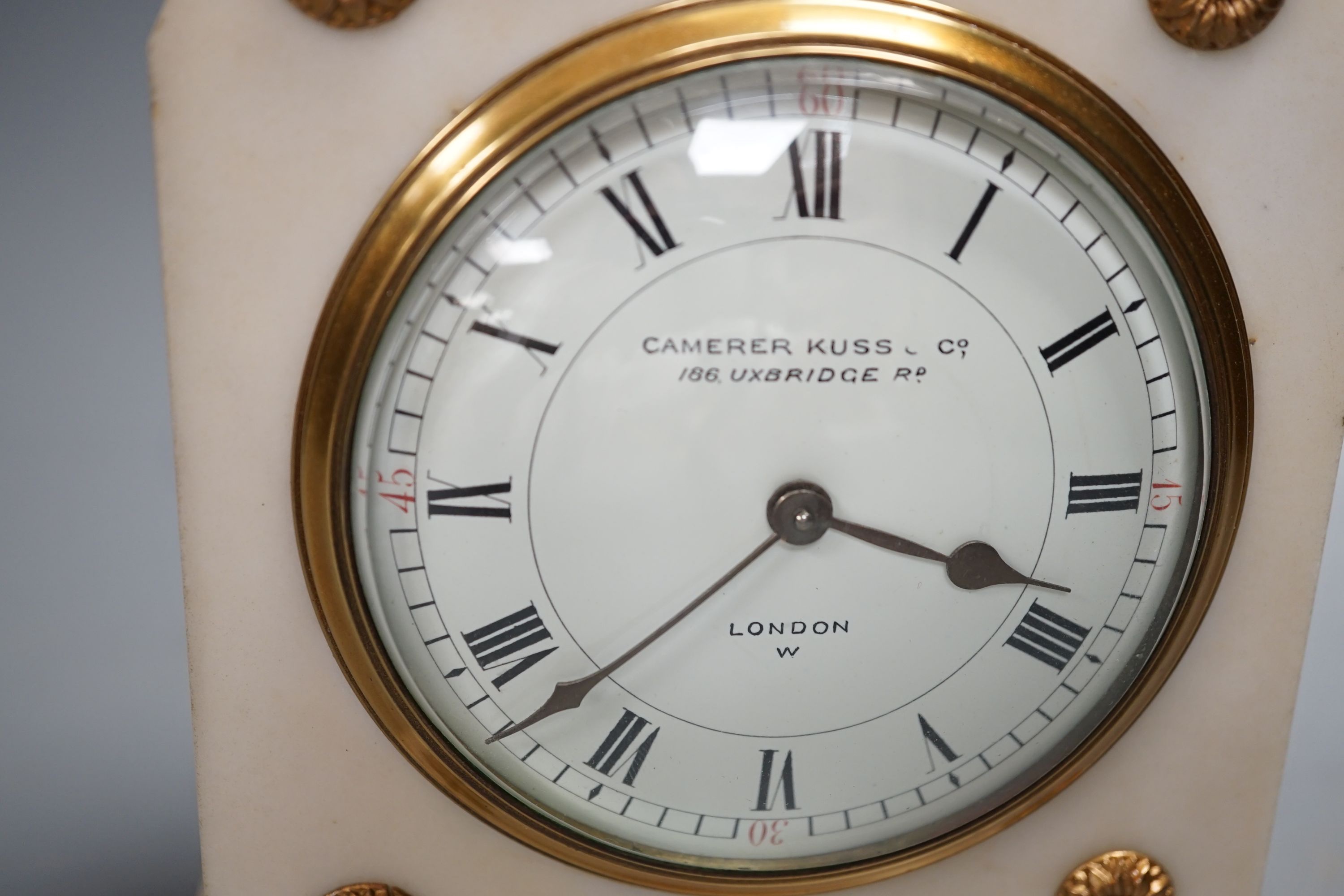 A Camerer Kuss marble and ormolu mantel clock, lion mark to movement with key, 18cm tall